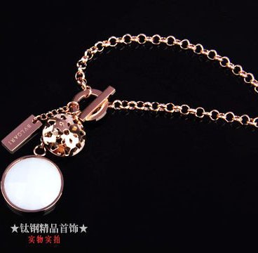 Bvlgari Charm Bracelet in 18kt Pink Gold with White Mother of Pe