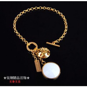 Bvlgari Charm Bracelet in 18kt Yellow Gold with White Mother of